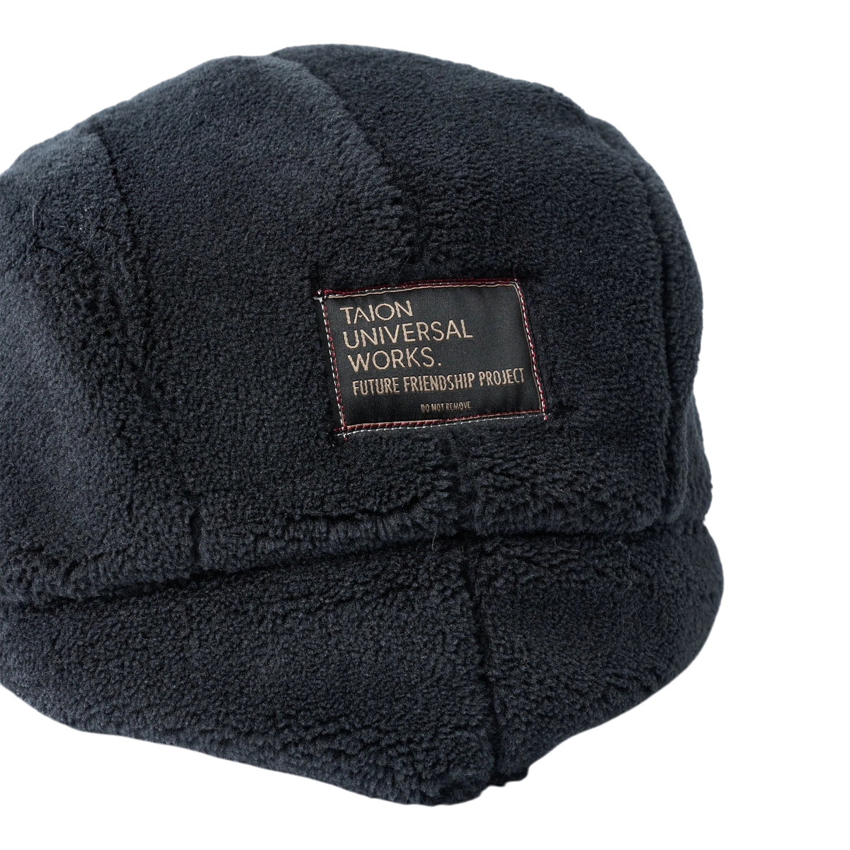 MILWORKS Universal Works x Taion black fleece reversible hat with a branded patch on the back
