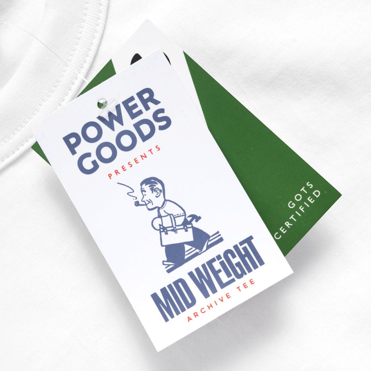 MILWORKS white organic cotton t-shirt with GOTS certified tag and vintage style graphic branding