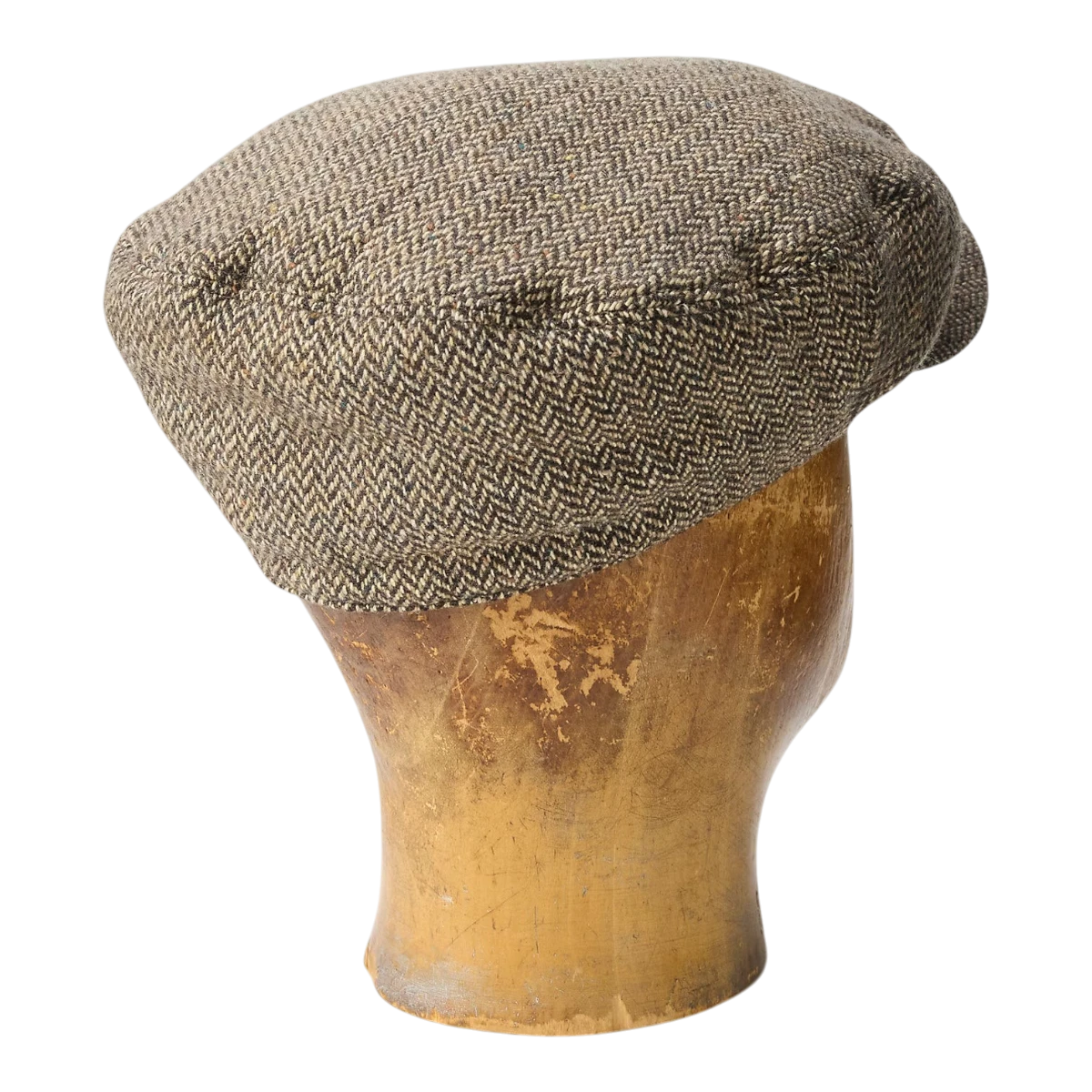 MILWORKS cream and brown wool-blend herringbone driver's cap with a seamed crown and snap-down brim on a mannequin head