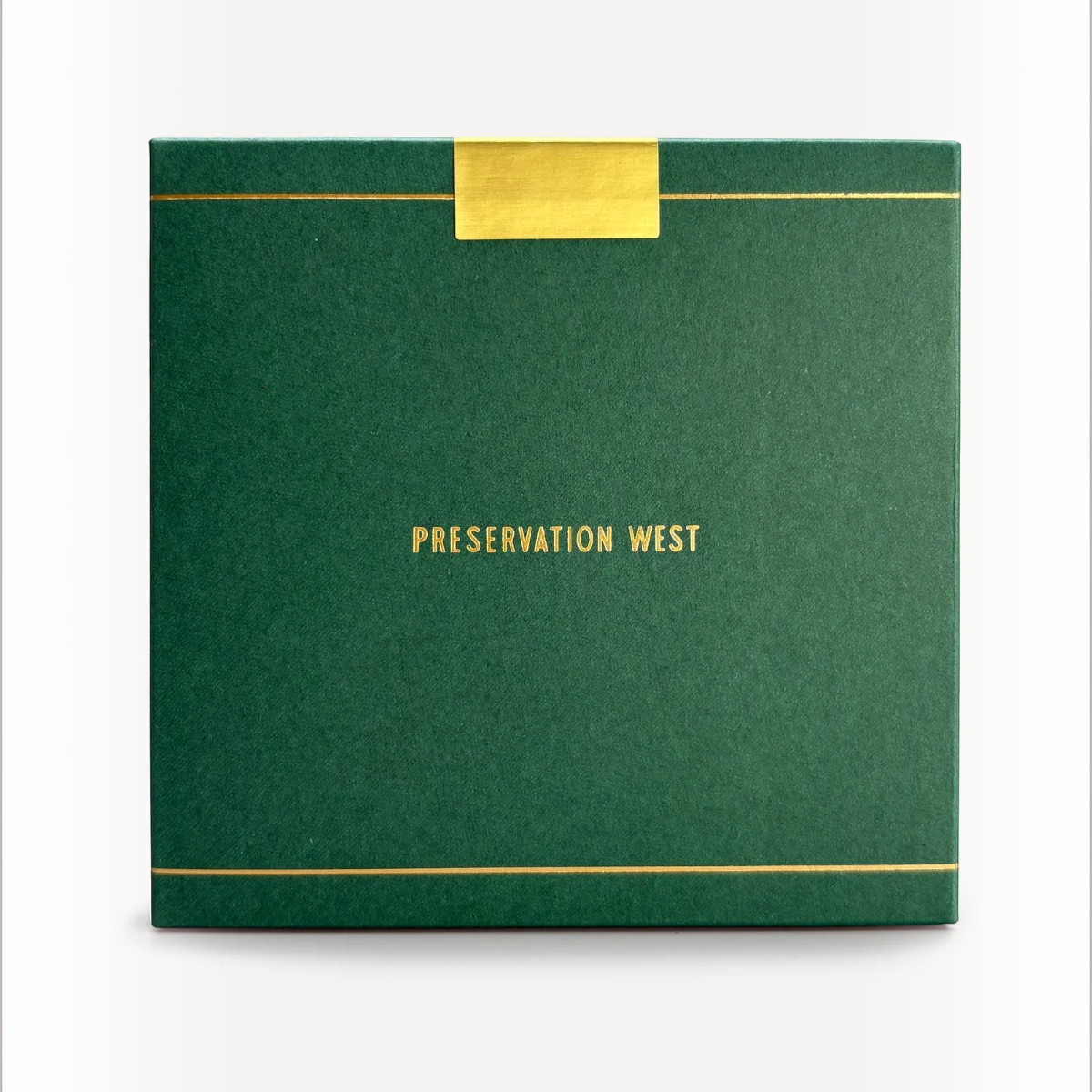 MILWORKS Youth perfume box in dark green with gold foil lettering and trim